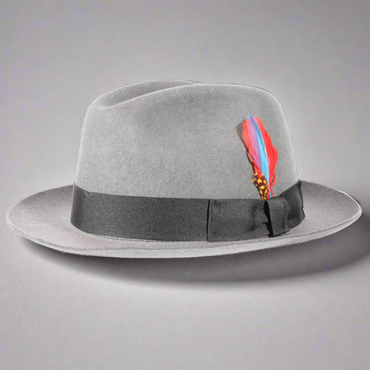 Men's Trilby Hat in Grey. A Trilby Hat is a narrow-brimmed type of hat. It was once viewed as the rich man's favored hat; it is sometimes called the "brown trilby" in Britain and was frequently seen at the horse races. Shop your Trilby Hat today in-store or online - we deliver throughout South Africa!