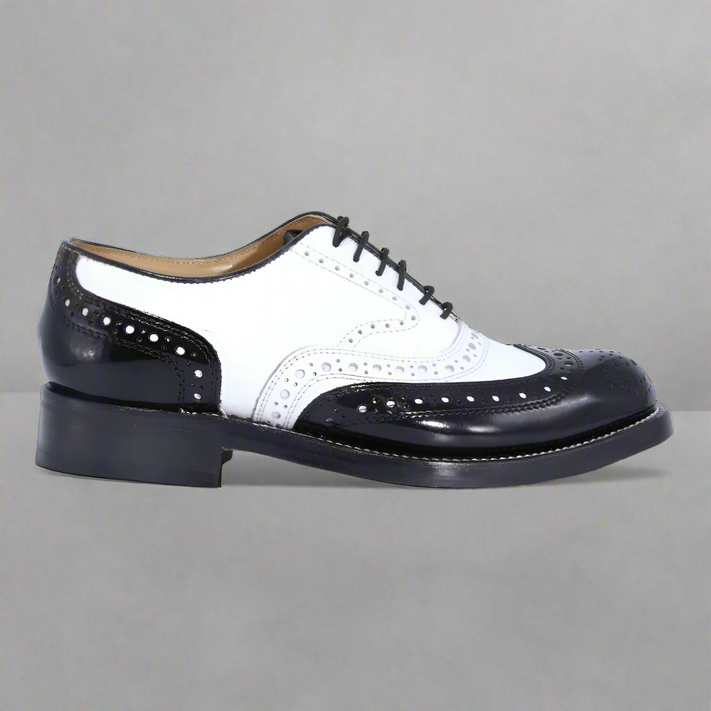 Men's Genuine Leather Crockett & Jones Brogue in Black & White, Lace-up Formal Dress Shoe available in-store, 337 Monty Naicker Street, Durban CBD or online at Omar's Tailors & Outfitters online store. A men's fashion curation for South African men - established in 1911.