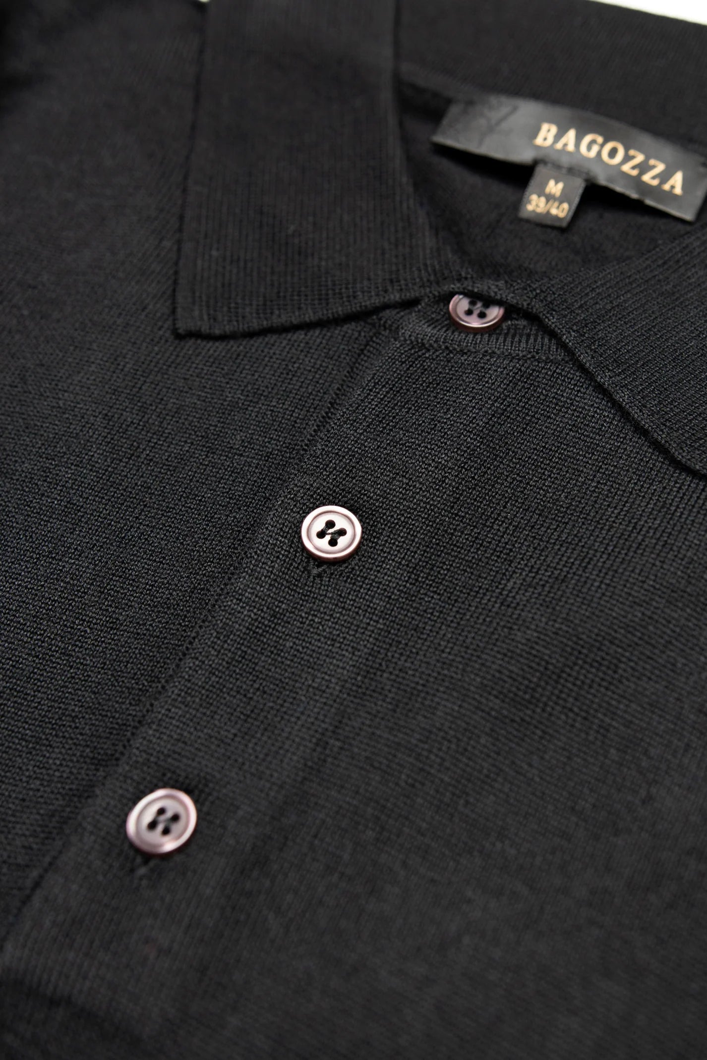 Men's Bagozza merino wool blend long-sleeve golf shirt with ribbing in black (8370) - available in-store, 337 Monty Naicker Street, Durban CBD or online at Omar's Tailors & Outfitters online store. A men's fashion curation for South African men - established in 1911.