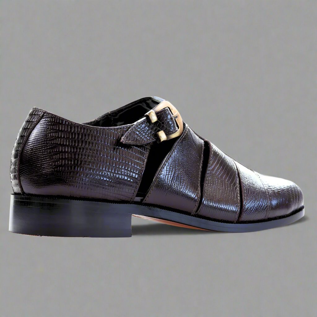 Discover the Ferradini Brown Formal Sandal featuring a lizard-embossed texture and adjustable buckle strap. Perfect for elegant and versatile wear. Shop now in-store at 337 Monty Naicker Street, Durban Central, or online at www.omarstailors.com.