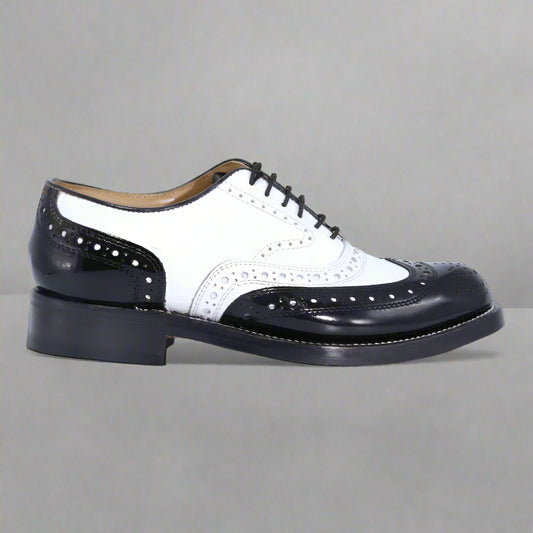 Men's Genuine Leather Crockett & Jones Brogue in Black & White, Lace-up Formal Dress Shoe available in-store, 337 Monty Naicker Street, Durban CBD or online at Omar's Tailors & Outfitters online store.   A men's fashion curation for South African men - established in 1911.