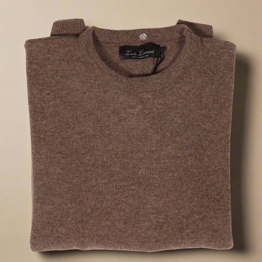 Stay warm and stylish with the Loch Lomond 100% lambswool long-sleeve jersey in Brown (3696). Made from premium lambswool, this jersey offers both comfort and durability. Perfect for chilly days and evenings, it's a versatile addition to any wardrobe. Shop in-store at 337 Monty Naicker Street, Durban or online at www.o…