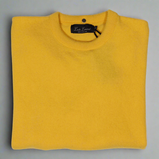 Stay warm and stylish with the Loch Lomond 100% lambswool long-sleeve jersey in Yellow (3696). Made from premium lambswool, this jersey offers both comfort and durability. Perfect for chilly days and evenings, it's a versatile addition to any wardrobe. Shop in-store at 337 Monty Naicker Street, Durban or online at www.omarstailors.com