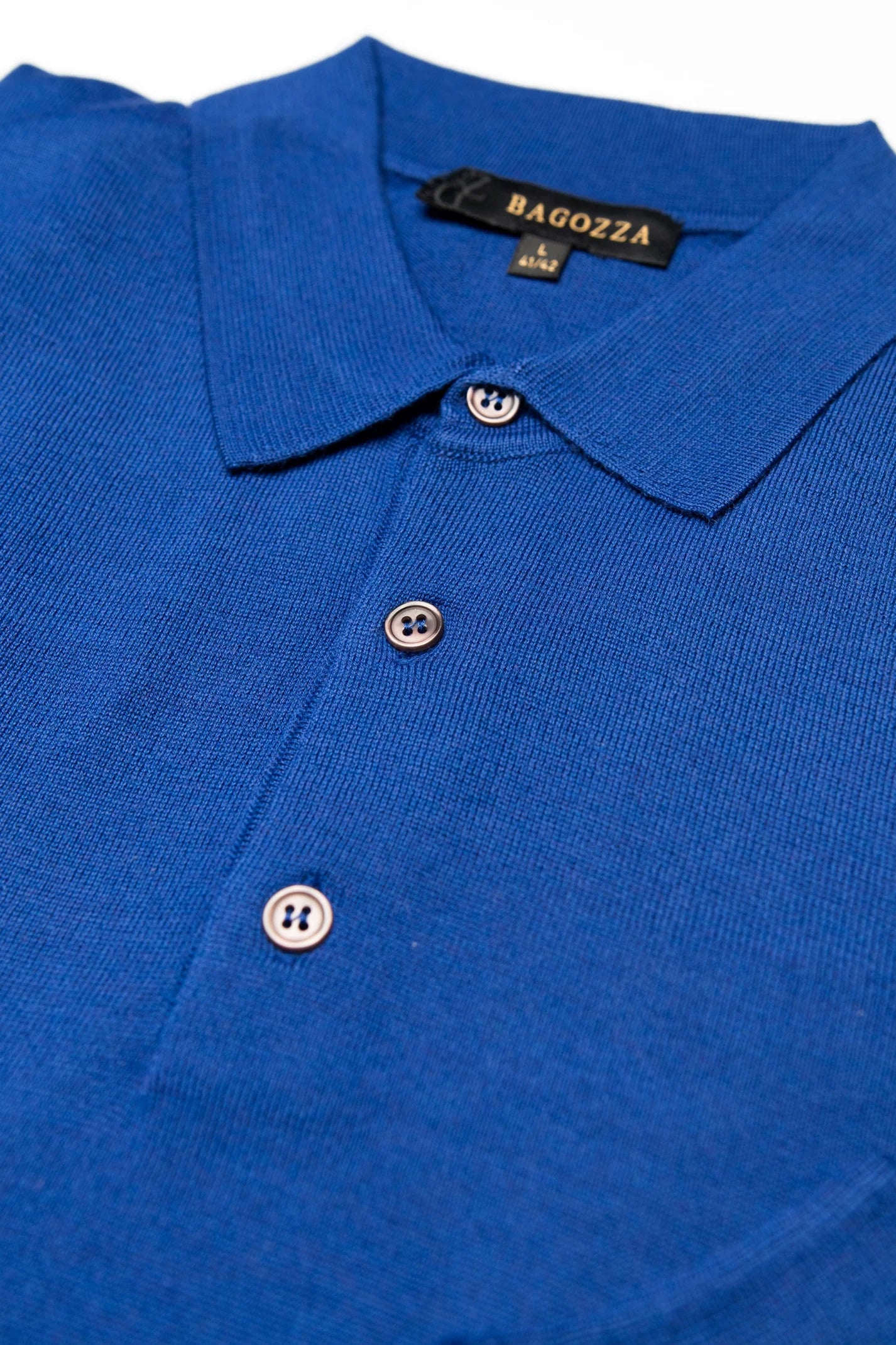 Men's Bagozza merino wool blend long-sleeve golf shirt with ribbing in blue (8370) - available in-store, 337 Monty Naicker Street, Durban CBD or online at Omar's Tailors & Outfitters online store.   A men's fashion curation for South African men - established in 1911.