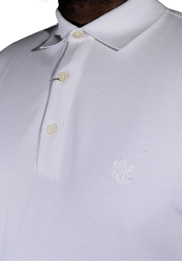 Men's Bagozza 100% cotton short sleeve golf shirt with textured sleeve cuff in white (6303) - available in-store, 337 Monty Naicker Street, Durban CBD or online at Omar's Tailors & Outfitters online store.   A men's fashion curation for South African men - established in 1911.