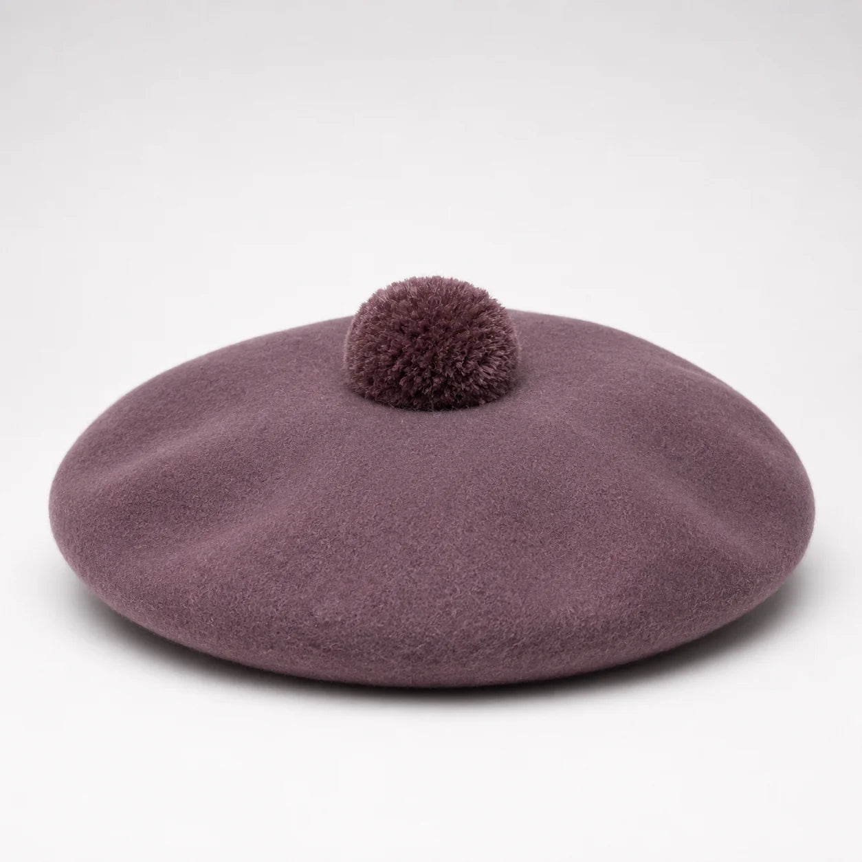 Men's Bostonian USA Beret in Brown with Pom Pom available in-store at 337 Monty Naicker Street, Durban Central or online at www.omarstailors.com.
