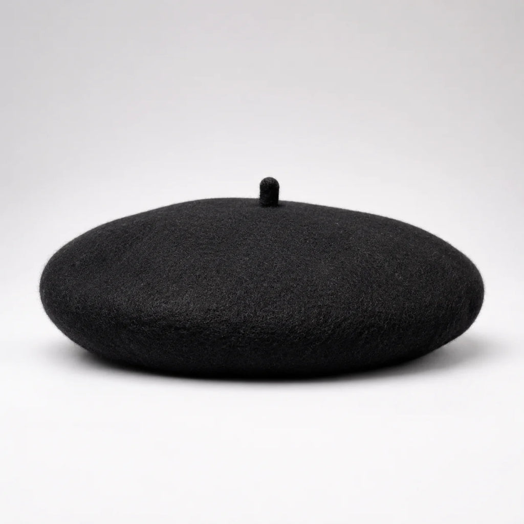 Black beret on a white background