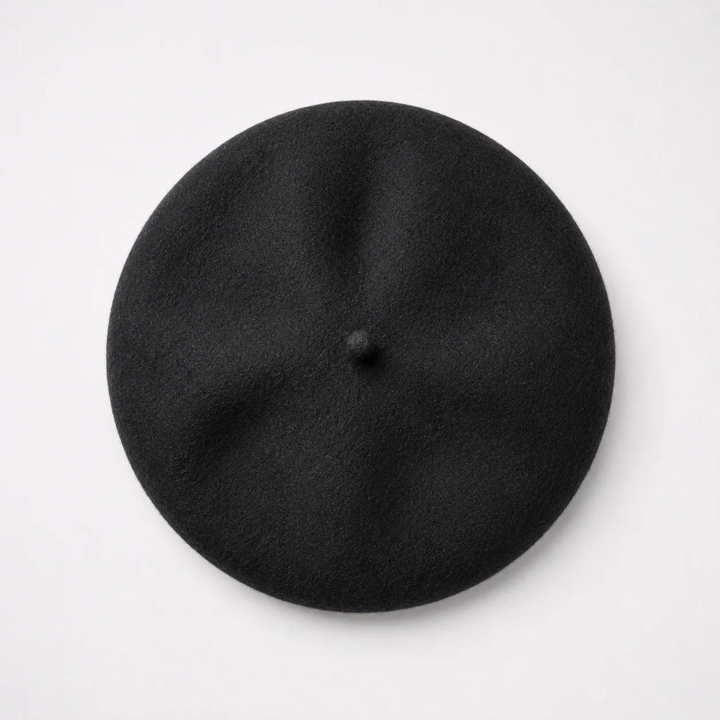 Black beret on a light gray background
