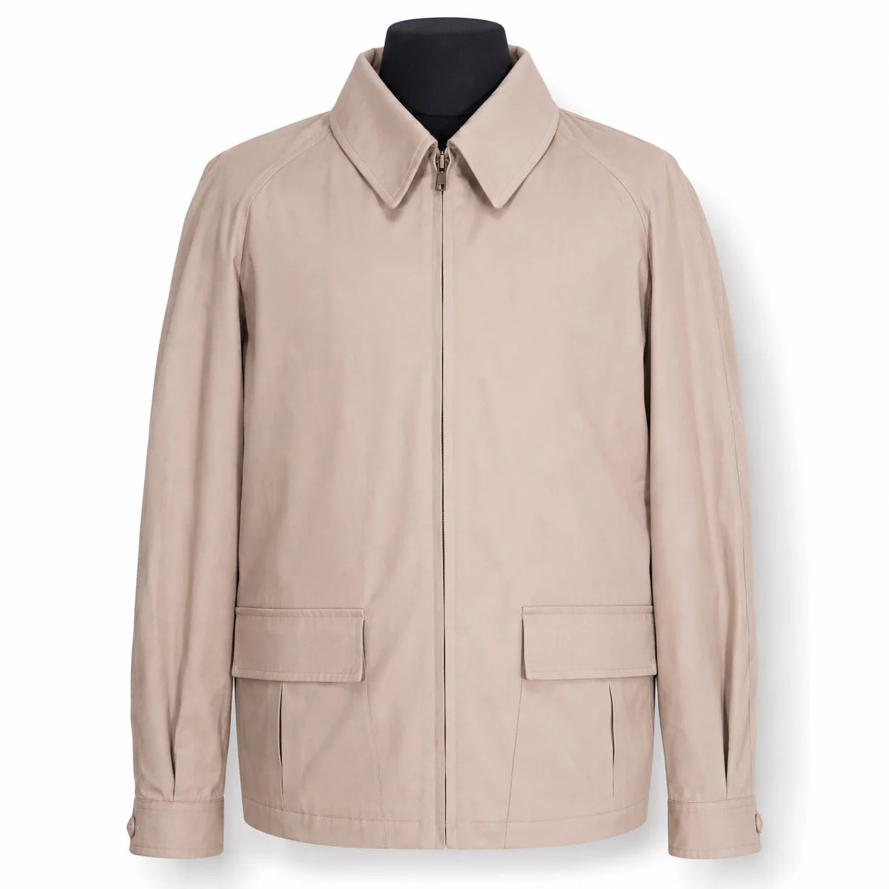 A light beige zip-up jacket with a pointed collar and two front flap pockets, displayed on a black mannequin torso against a white background.
