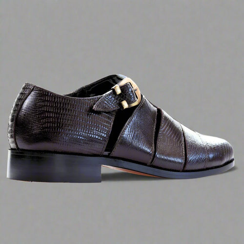 Discover the Ferradini Brown Formal Sandal featuring a lizard-embossed texture and adjustable buckle strap. Perfect for elegant and versatile wear. Shop now in-store at 337 Monty Naicker Street, Durban Central, or online at www.omarstailors.com.