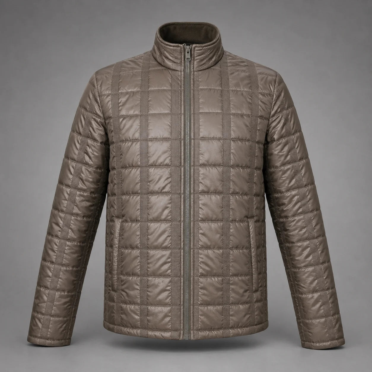 A men's quilted puffer jacket in a taupe-brown color, featuring a stand-up collar, full-length front zipper, and vertical quilting details, shown against a neutral gray background.