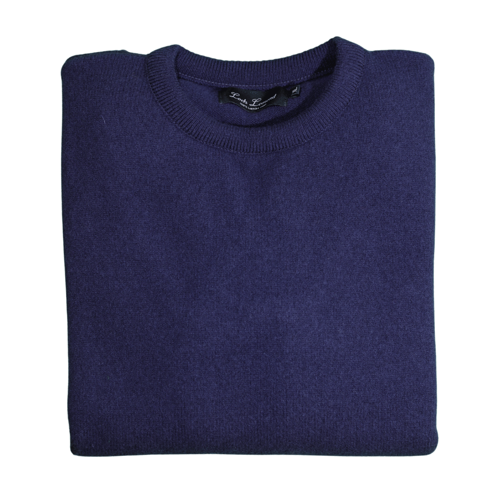 Men's Loch Lomond 100% Lambswool Crew Neck Jersey in Navy (3696) available in-store, 337 Monty Naicker Street, Durban CBD or online at Omar's Tailors & Outfitters online store. 

A men's fashion curation for South African men - established in 1911.