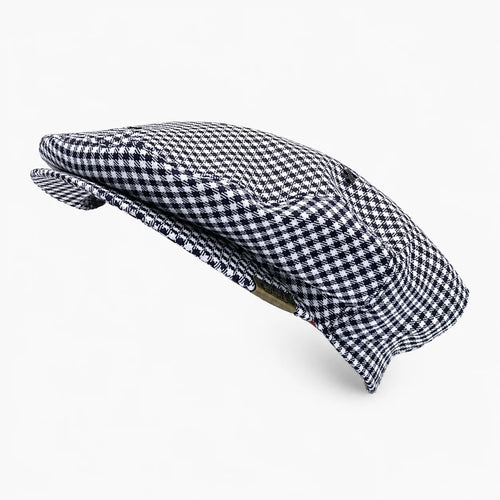 Men's Navada Twill County Cap in Black & White Check available in-store at 337 Monty Naicker Street, Durban Central or online at www.omarstailors.com.