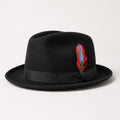 Men’s black trilby fedora hat with red and blue feather accent.