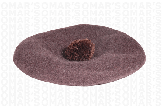 Men's Bostonian beret with pom-pom in brown is available in-store or online at Omar's Tailors