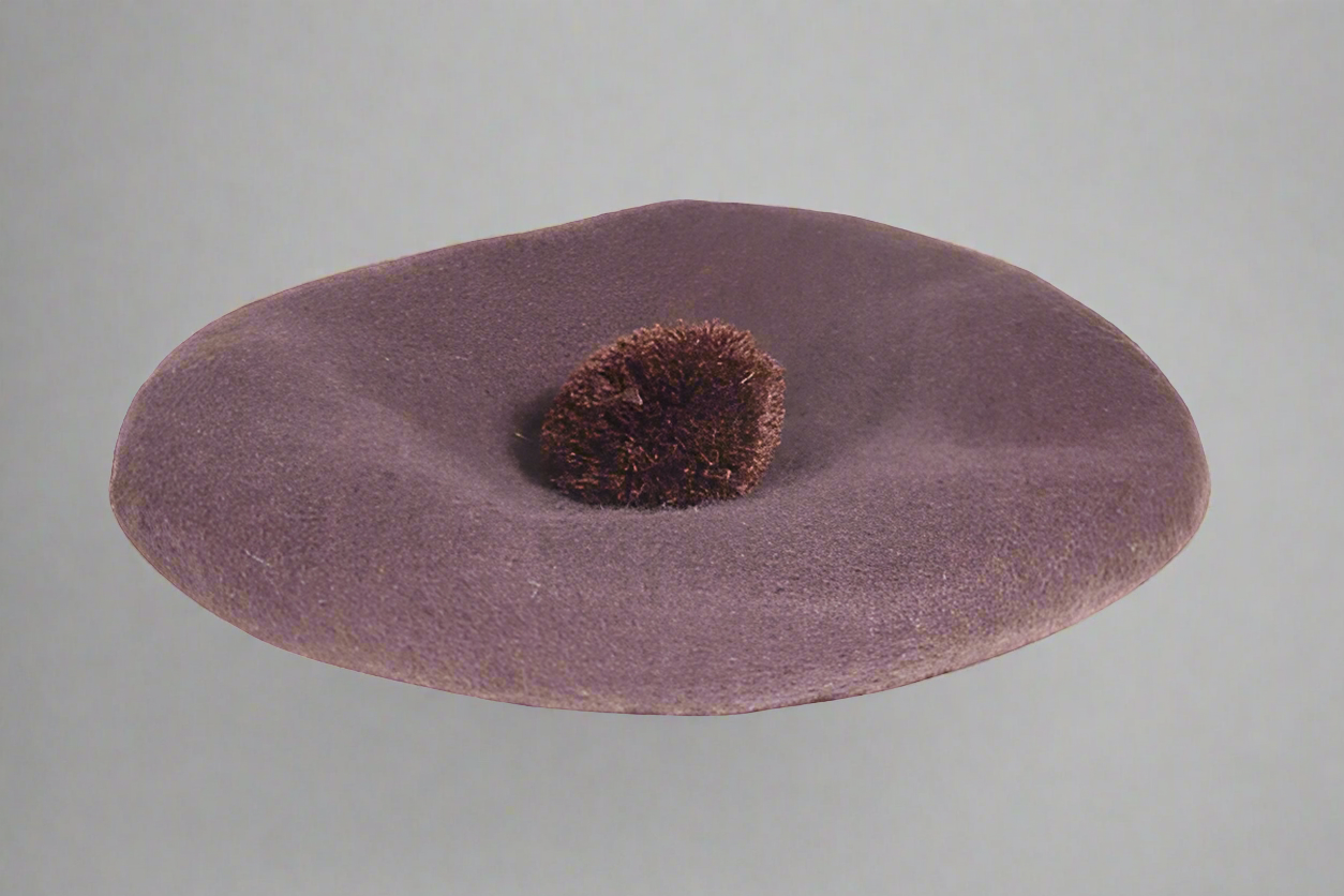 Men's Bostonian beret with pom-pom in brown is available in-store or online at Omar's Tailors