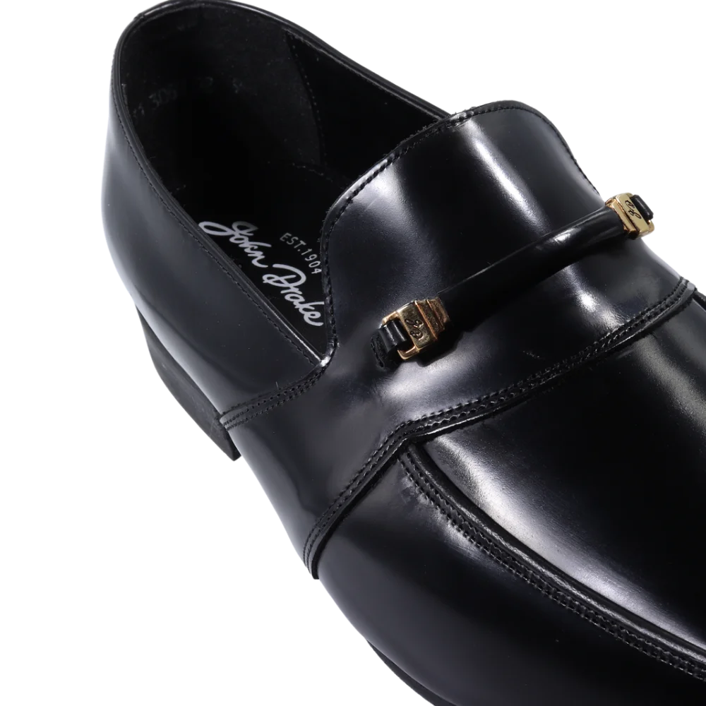 Men's genuine leather upper John Drake Moccasin/ slip-on/ loafer formal shoe in black available in store, 337 Monty Naicker Street, Durban CBD or online at Omar's Tailors & Outfitters online store.