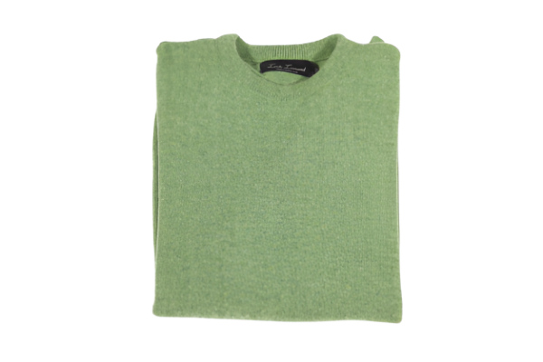 Stay warm and stylish with the Loch Lomond 100% lambswool long-sleeve jersey in Green (3696). Made from premium lambswool, this jersey offers both comfort and durability. Perfect for chilly days and evenings, it's a versatile addition to any wardrobe. Shop in-store at 337 Monty Naicker Street, Durban or online at www.omarstailors.com