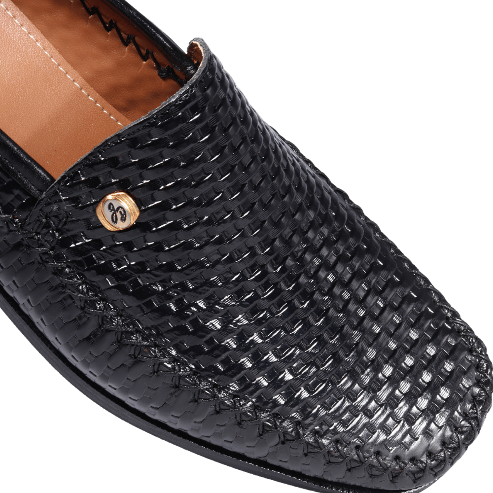 Men's genuine leather John Drake moccasin/ loafer in black with a weave finish available in store, 337 Monty Naicker Street, Durban or online at Omar's Tailors & Outfitters online store.  A men's fashion curation for South African men - established in 1911.